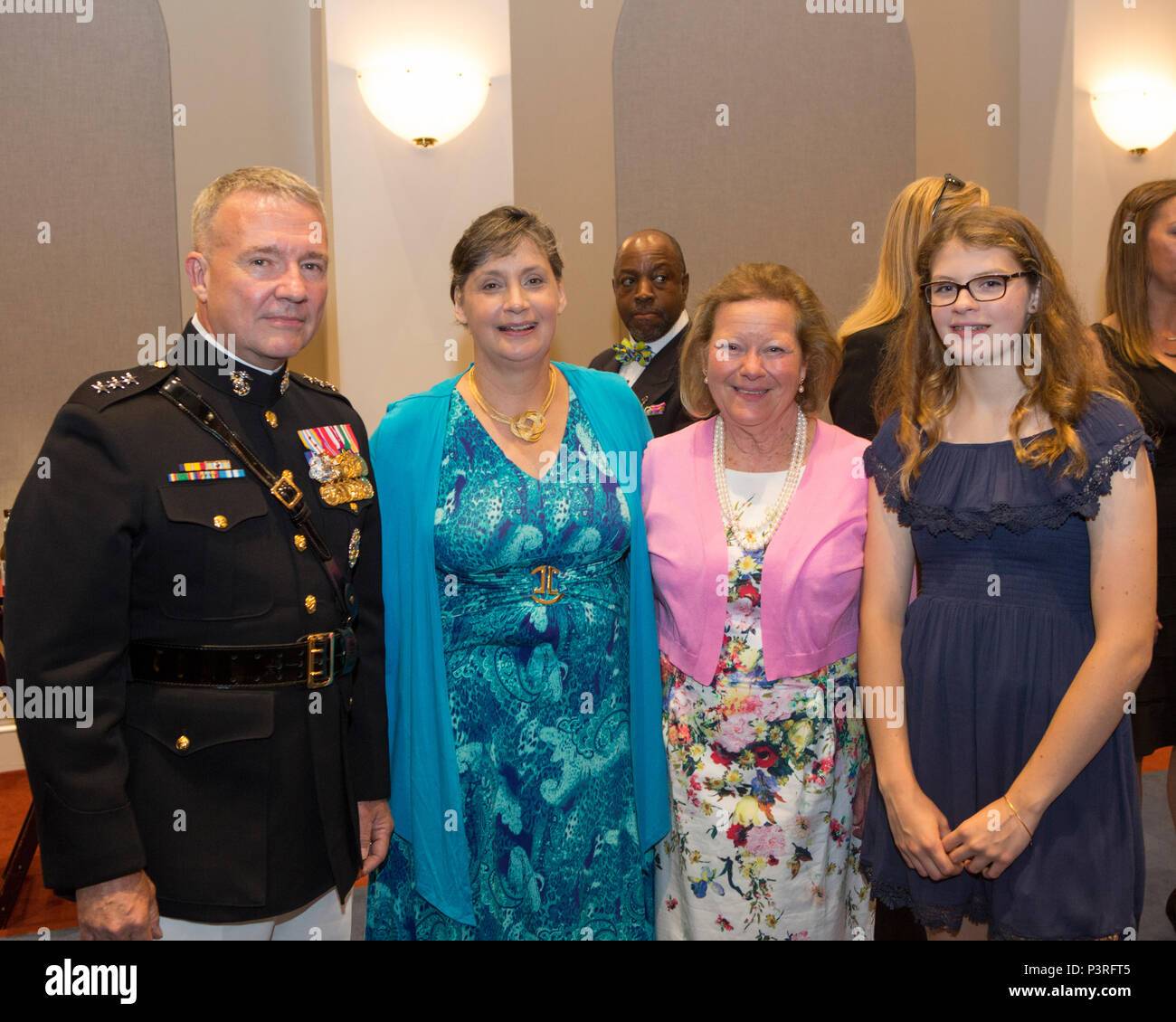 us marine corps lt gen kenneth f mckenzie jr director strategic plans and policy j 5 poses for a photo with family during a reception prior to the evening parade at marine barracks